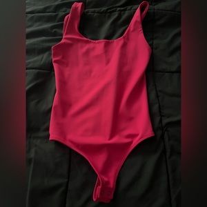 Hot pink bodysuit